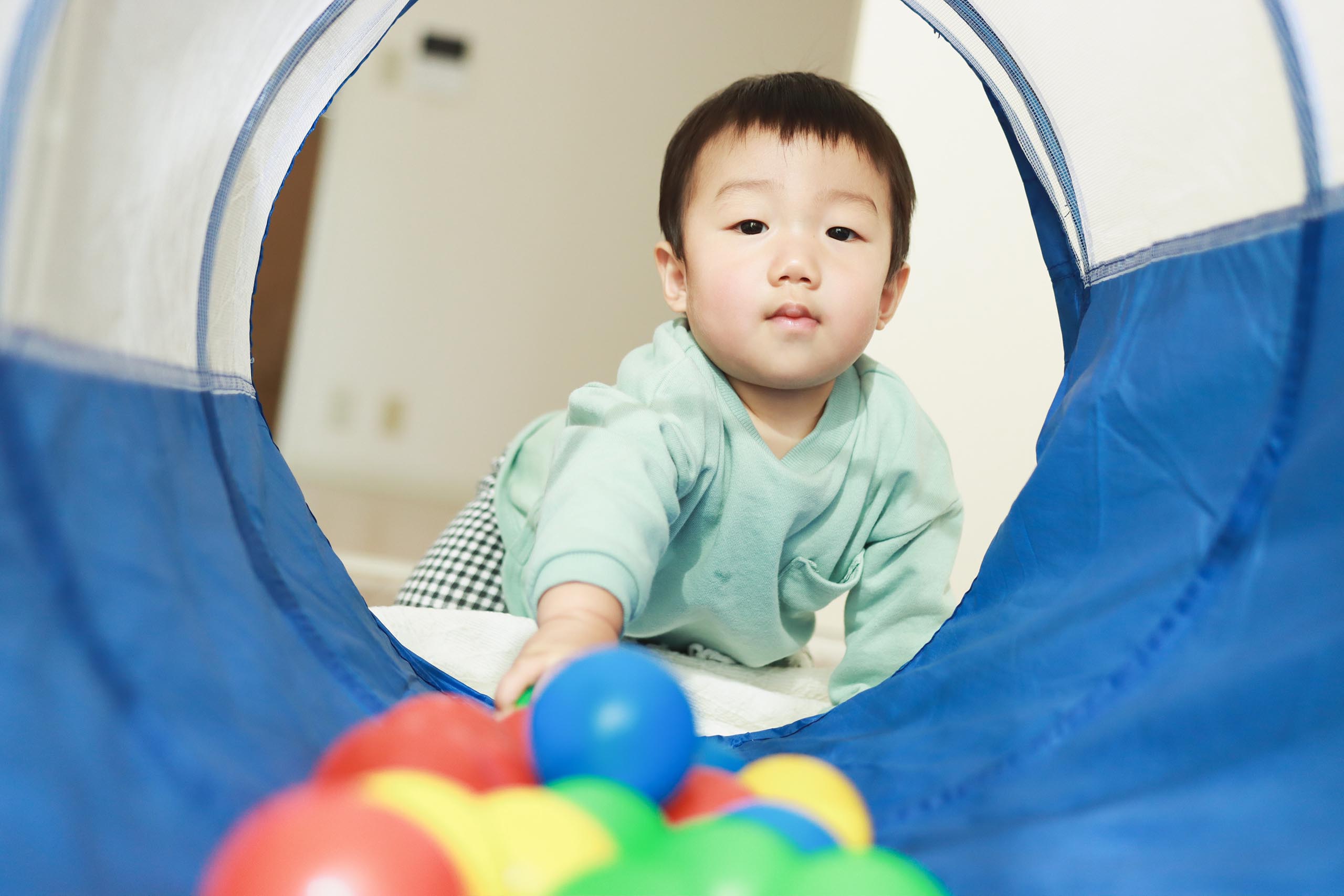 Photo of a baby playing.